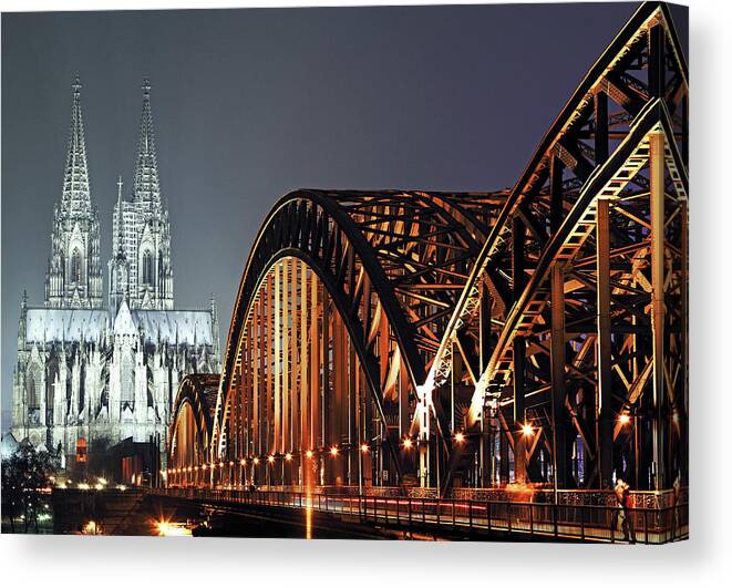 North Rhine Westphalia Canvas Print featuring the photograph Bridge And Cathedral by Allan Baxter