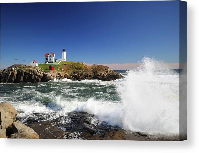 Water's Edge Canvas Print featuring the photograph Cape Neddick Maine by Gmnicholas