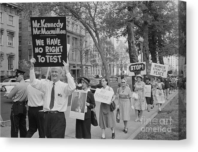 Mid Adult Women Canvas Print featuring the photograph Chemist Linus Pauling Protesting by Bettmann