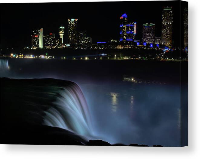Niagara Falls Canvas Print featuring the photograph City Lights and Soft Falls by Vicky Edgerly