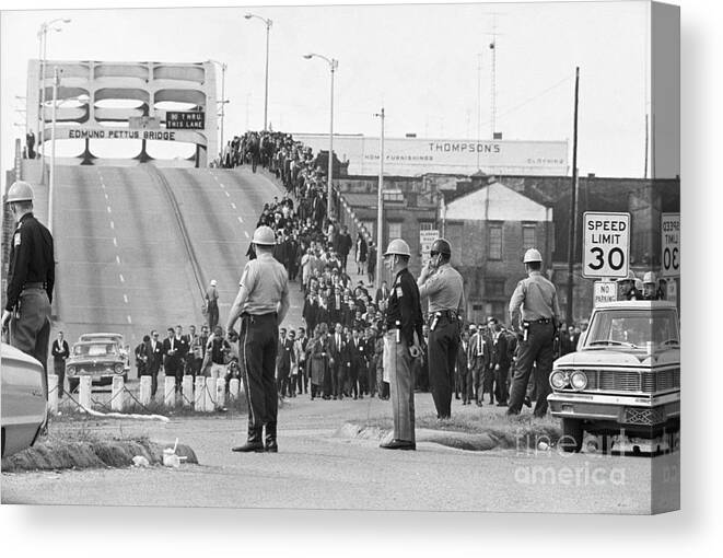 Marching Canvas Print featuring the photograph Civil Rights Marchers On Bridge by Bettmann