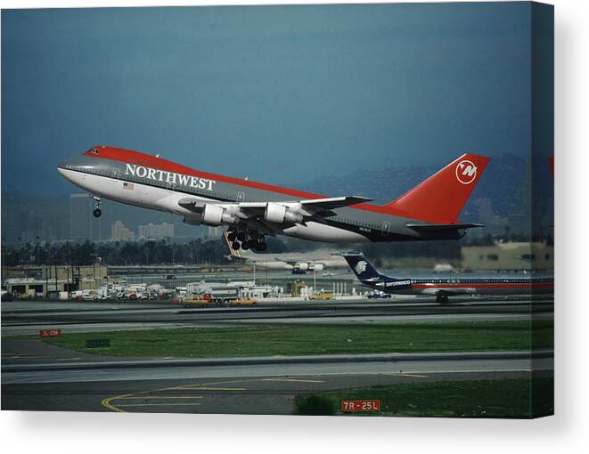 Northwest Airlines Canvas Print featuring the photograph Classic Northwest Airlines Boeing 747 by Erik Simonsen