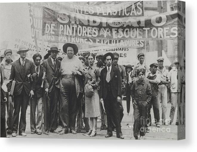 Photo Canvas Print featuring the photograph Diego Rivera And Frida Kahlo In The May Day Parade, Mexico City, 1st May 1929 by Tina Modotti