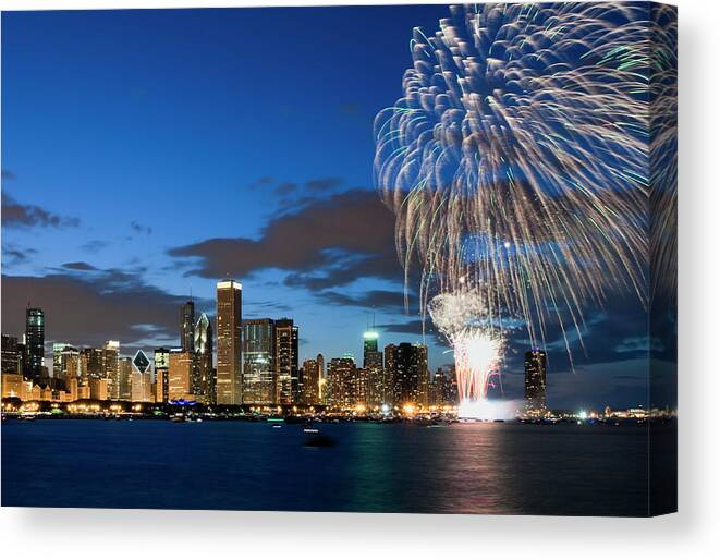 Water's Edge Canvas Print featuring the photograph Fireworks Exploding Over Chicago by Chrisp0