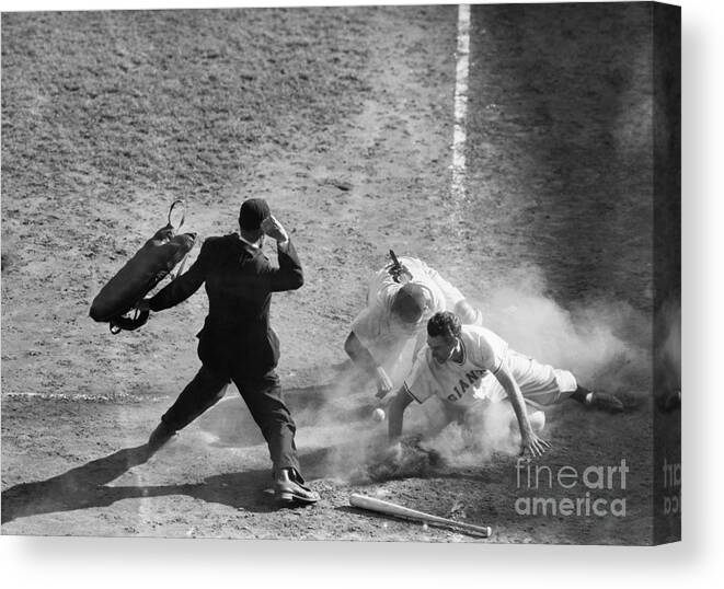 Alvin Dark Canvas Print featuring the photograph Giants Player Slides Into Home And Yogi by Bettmann