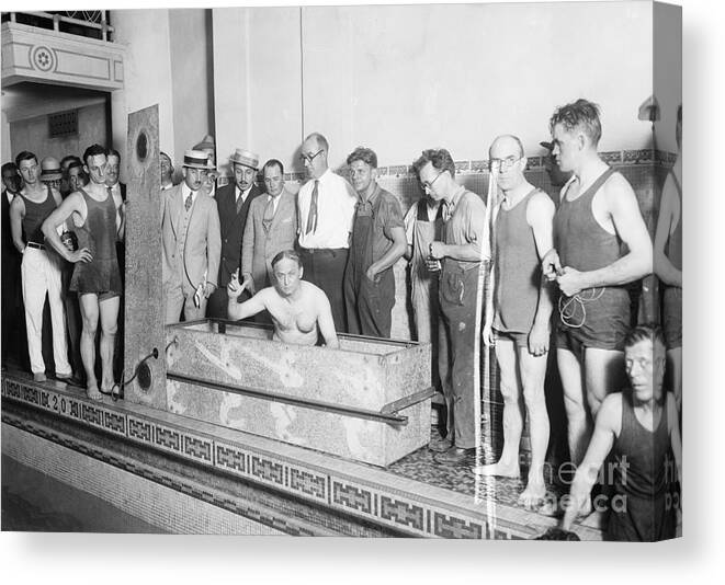 People Canvas Print featuring the photograph Harry Houdini In Casket Before Stunt by Bettmann