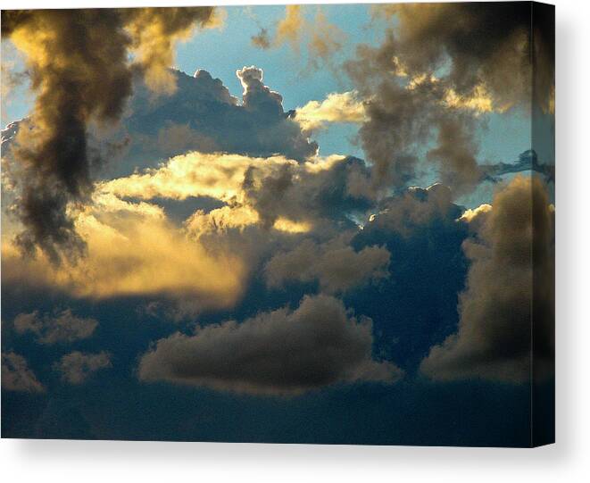 Clouds Canvas Print featuring the photograph In the Clouds by Neil Pankler
