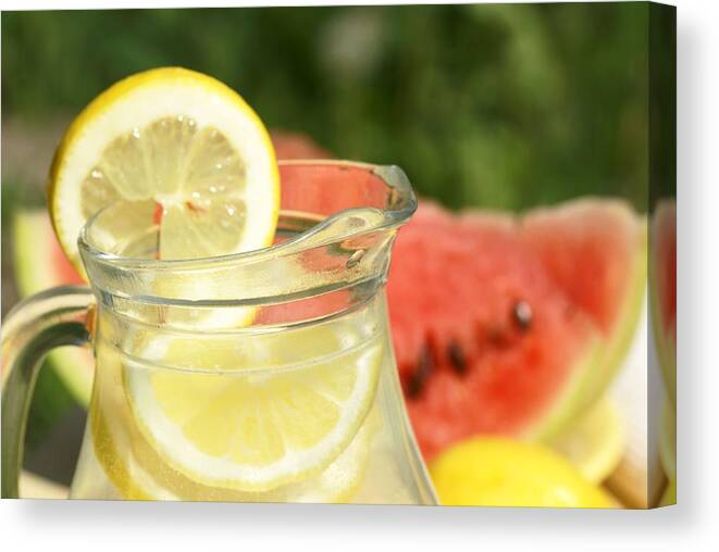 Purified Water Canvas Print featuring the photograph Lemonade And Fruits by Mkucova