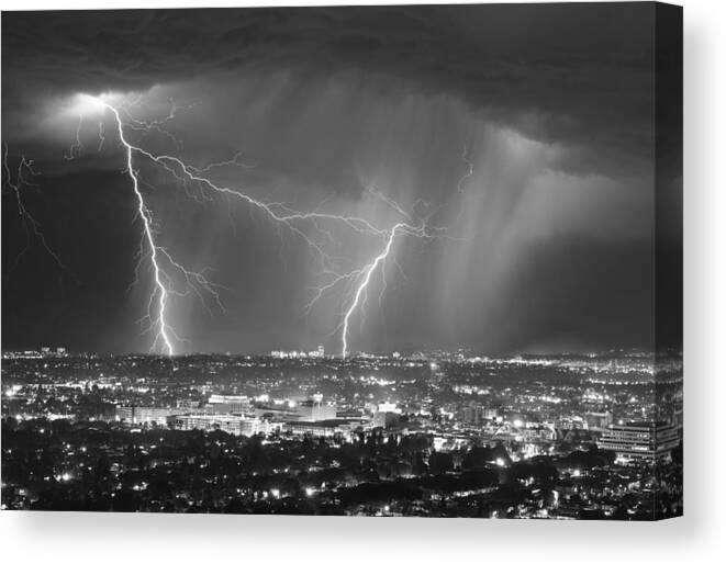 Sky Canvas Print featuring the photograph Lightning Strike The City by Jay Wang