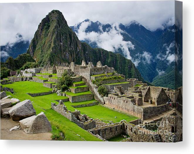 Civilization Canvas Print featuring the photograph Machu Picchu In Peru Unesco World by Byelikova Oksana