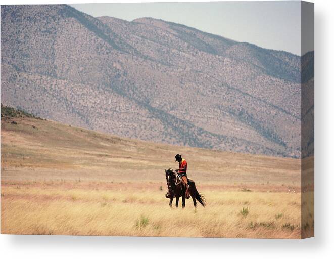Horse Canvas Print featuring the photograph Man Riding Horse In Landscape by Christopher Pillitz