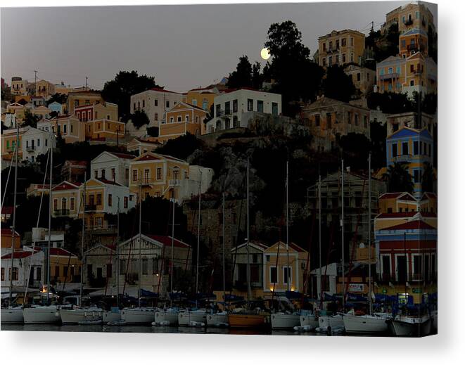 Greece Canvas Print featuring the photograph Moonrise over Symi by Jonathan Thompson