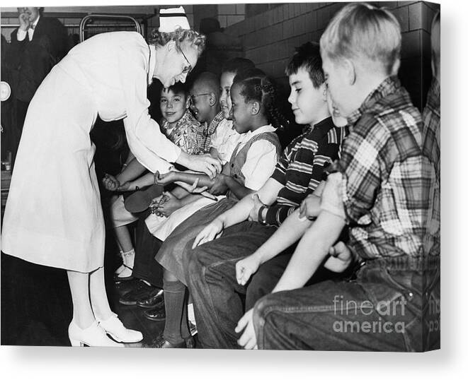 Event Canvas Print featuring the photograph Nurse Preparing Children For Polio by Bettmann