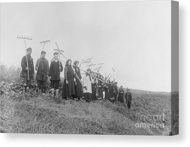 Farm Worker Canvas Print featuring the photograph Russian Villagers With Tools Preparing by Bettmann