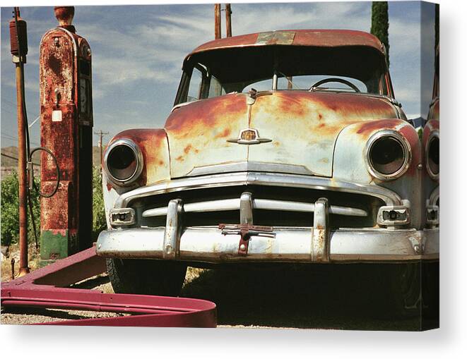 Outdoors Canvas Print featuring the photograph Rusted Car In Petrol Station by Liz Gregg