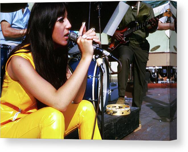 People Canvas Print featuring the photograph Sonny & Cher At Hollywood Bowl by Michael Ochs Archives