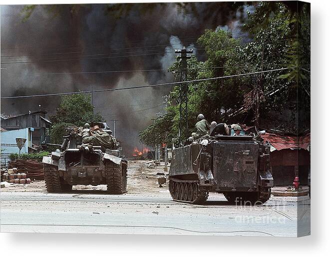 Ho Chi Minh City Canvas Print featuring the photograph Tanks And Armored Vehicles Forming by Bettmann
