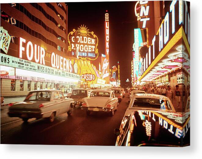 People Canvas Print featuring the photograph Taxi Filled Street During Las Vegas by Bettmann
