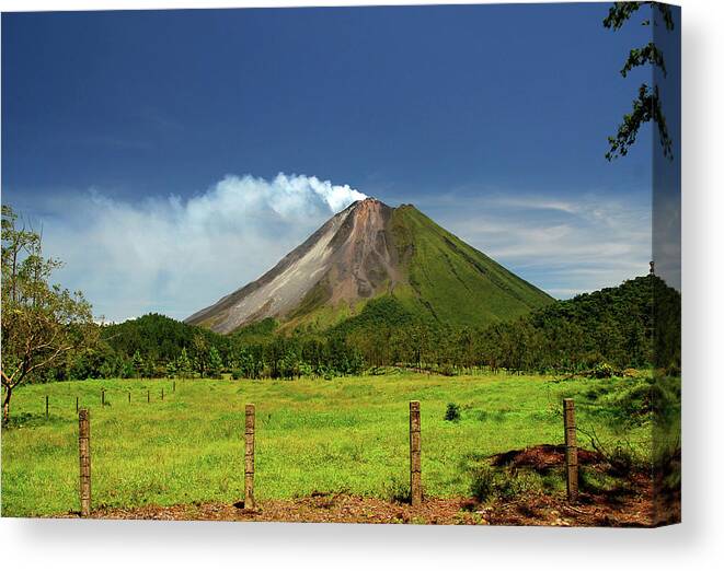 Scenics Canvas Print featuring the photograph The Classic Cone Shape of Arenal Volcano in Costa Rica by Tito Slack