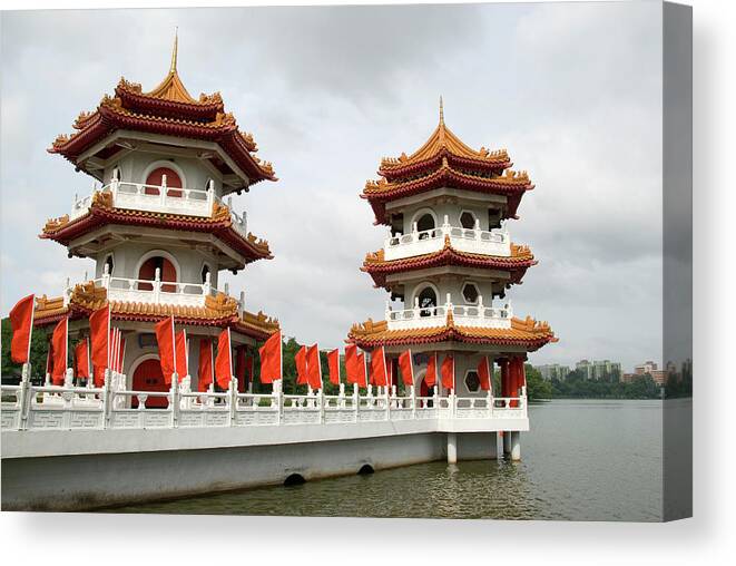 Chinese Culture Canvas Print featuring the photograph White Pagoda With Red Flags by Frankvandenbergh