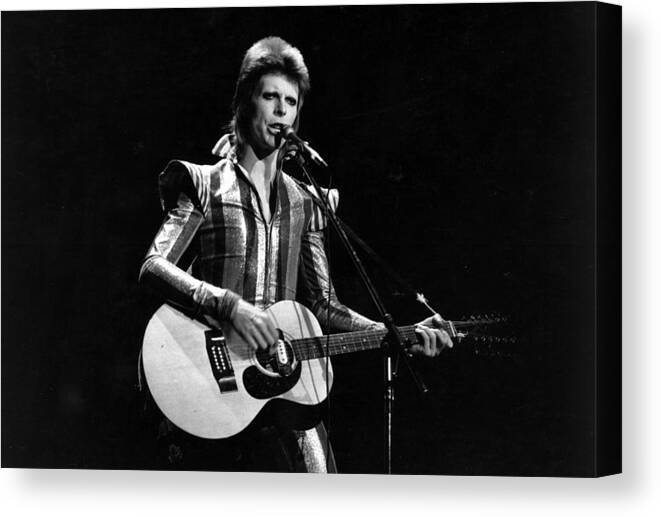 Ziggy Stardust - Persona Canvas Print featuring the photograph Ziggy Plays Guitar by Express