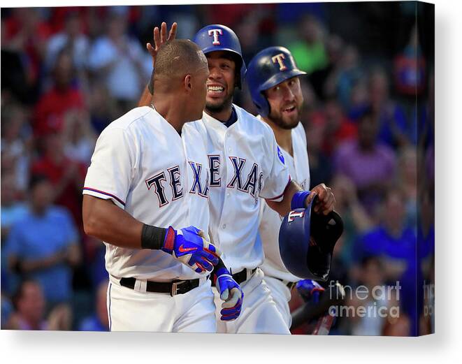 Adrian Beltre Canvas Print featuring the photograph Adrian Beltre, Elvis Andrus, and Nomar Mazara by Tom Pennington