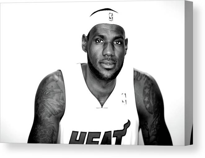 Nba Pro Basketball Canvas Print featuring the photograph Lebron James by Mike Ehrmann