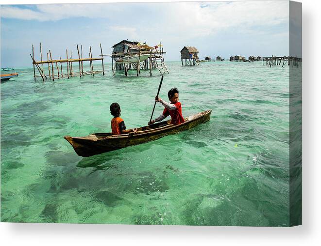 Sea Canvas Print featuring the photograph Neptune's Children - Sea Gypsy Village, Sabah. Malaysian Borneo by Earth And Spirit