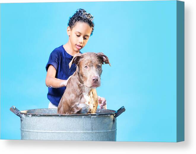 Pets Canvas Print featuring the photograph Boy bathing his dog #2 by Thepalmer