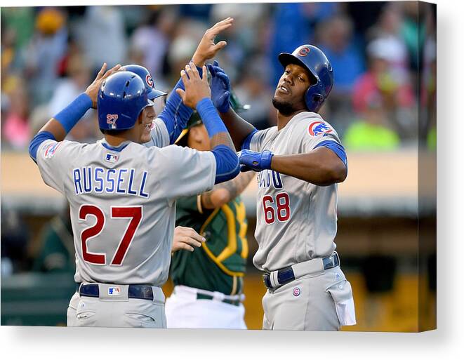 Oakland Canvas Print featuring the photograph Anthony Rizzo, Jorge Soler, and Addison Russell by Thearon W. Henderson