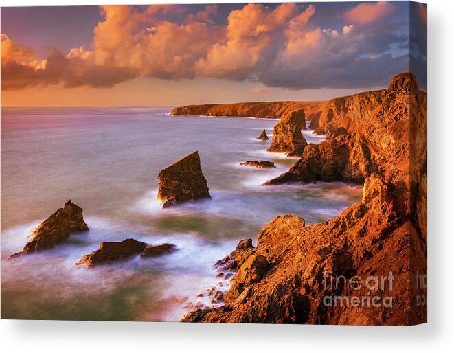 Bedruthan Steps Canvas Print featuring the photograph Bedruthan Steps Sunset, Cornwall, England by Neale And Judith Clark
