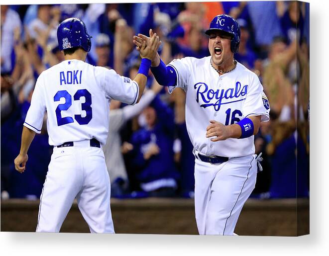 American League Baseball Canvas Print featuring the photograph Billy Butler and Alcides Escobar by Jamie Squire