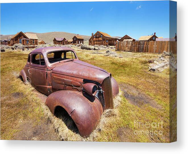 Bodie Canvas Print featuring the photograph Bodie ghost town,1937 Chevrolet coupe, California by Neale And Judith Clark