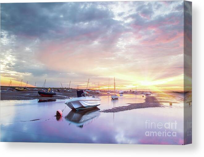Norfolk Canvas Print featuring the photograph Brancaster Staithe boat harbour at sunrise in Norfolk by Simon Bratt