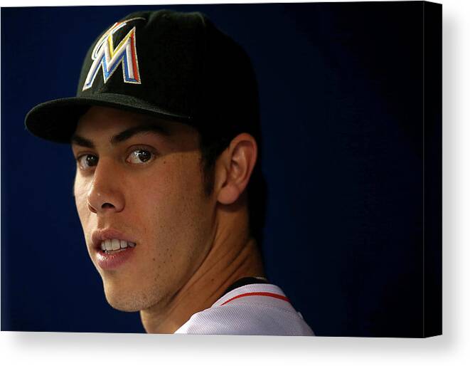 American League Baseball Canvas Print featuring the photograph Christian Yelich by Mike Ehrmann