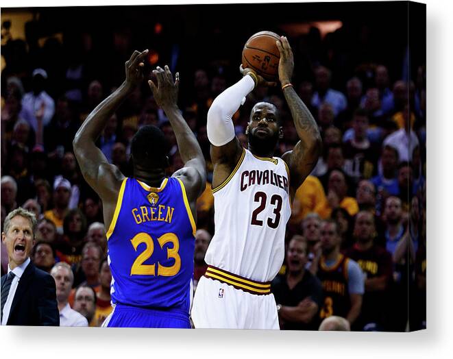 Playoffs Canvas Print featuring the photograph Draymond Green and Lebron James by Ezra Shaw
