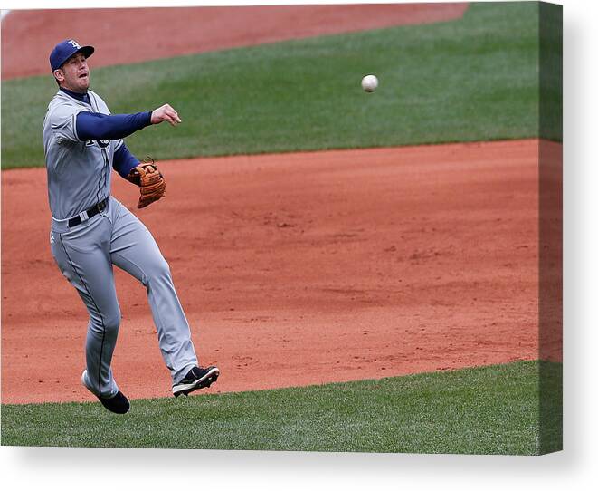 American League Baseball Canvas Print featuring the photograph Evan Longoria and Dustin Pedroia by Jim Rogash