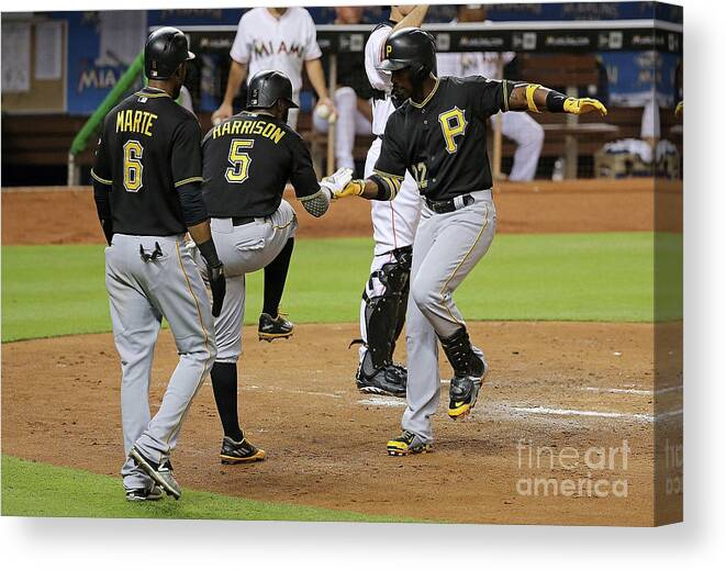 People Canvas Print featuring the photograph Josh Harrison, Andrew Mccutchen, and Starling Marte by Mike Ehrmann