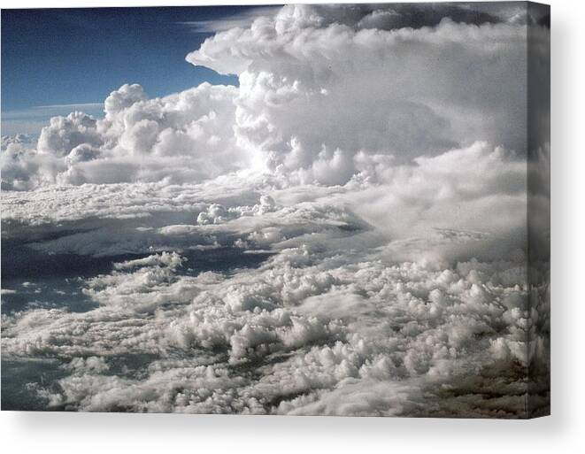 Photograph Clouds White Sky Canvas Print featuring the photograph Looking Down on Clouds by Beverly Read