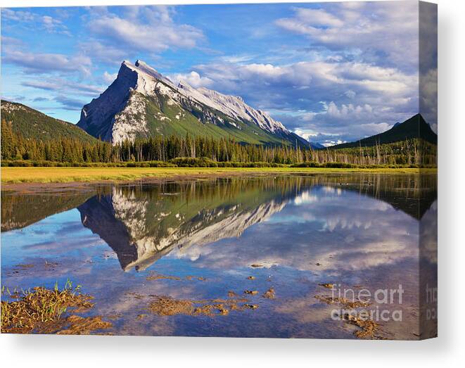 Mount Rundle Canvas Print featuring the photograph Mount Rundle reflected in Vermillion Lakes, Canadian Rockies by Neale And Judith Clark