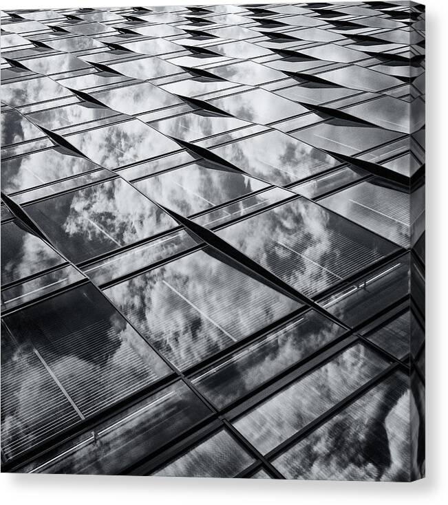 Architecture Canvas Print featuring the photograph Cutting The Clouds by Darko Ivancevic