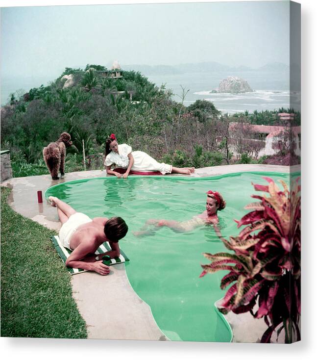 People Canvas Print featuring the photograph Del Rio By The Pool by Slim Aarons