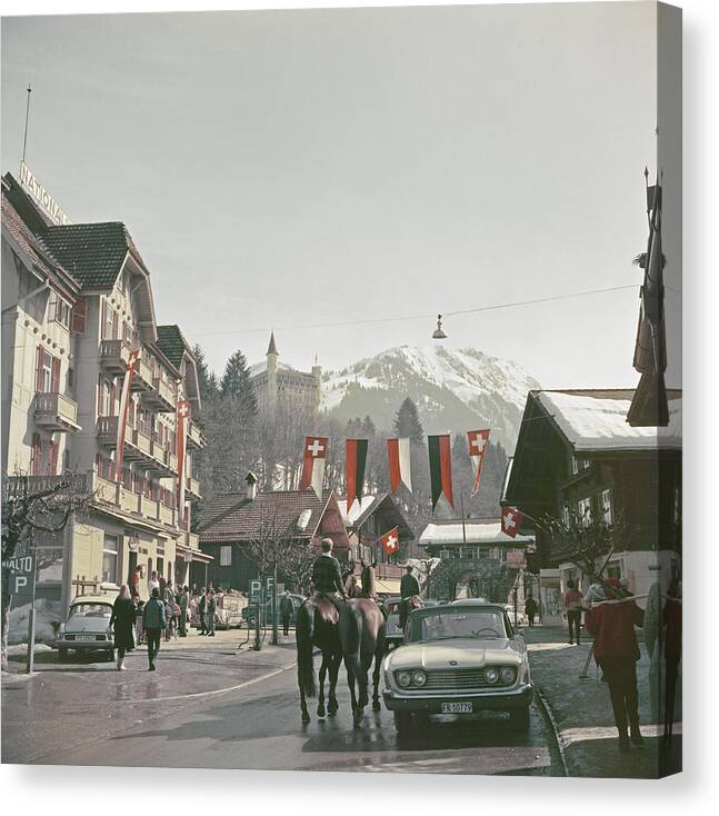 Gstaad Canvas Print featuring the photograph Gstaad Town Centre by Slim Aarons