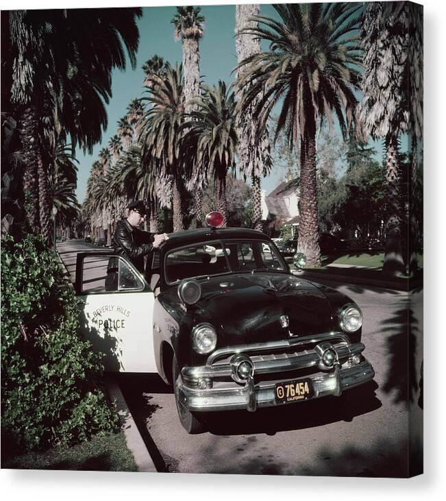 People Canvas Print featuring the photograph Police Patrolman by Slim Aarons