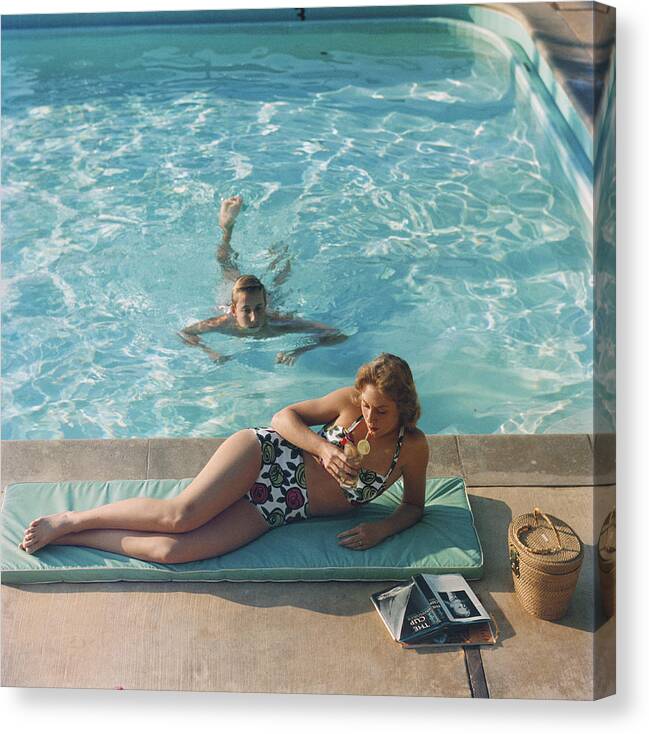 Young Men Canvas Print featuring the photograph Poolside On Shelter Island by Slim Aarons