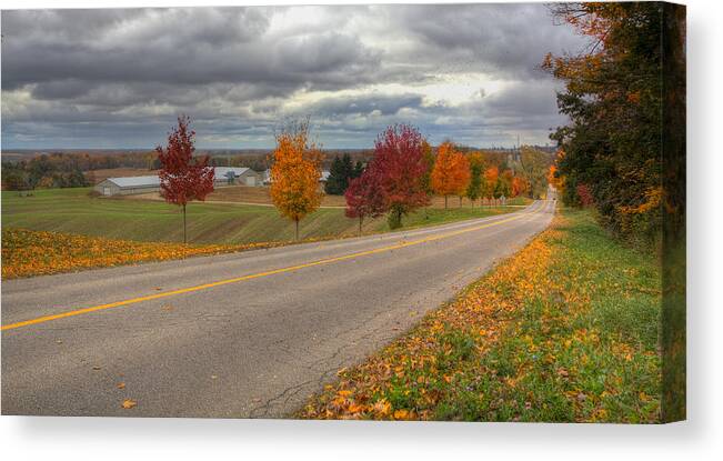 Back Roads Canvas Print featuring the photograph The magic of the fall #1 by Nick Mares