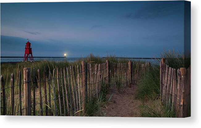 Beach Grass Canvas Print featuring the photograph A Sand Pathway Lined With A Wooden by John Short