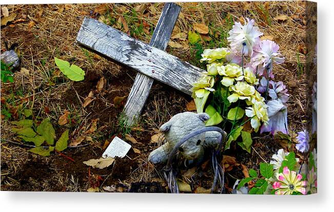Grave Canvas Print featuring the photograph Child's Grave by Jeff Lowe