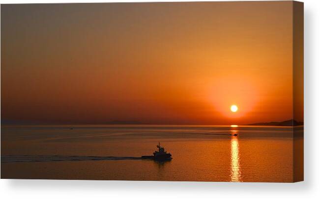 Boat Canvas Print featuring the photograph Heading Home by Corinne Rhode