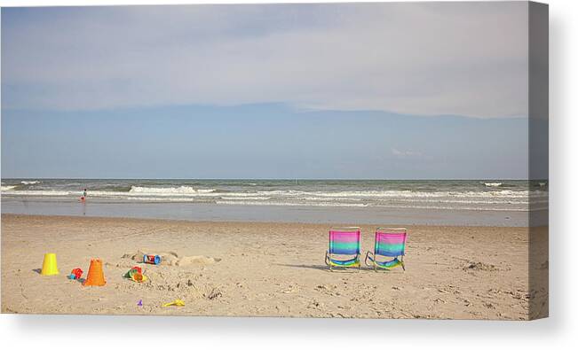 Recreational Pursuit Canvas Print featuring the photograph Matching Chairs On The Beach by Marilyn Nieves